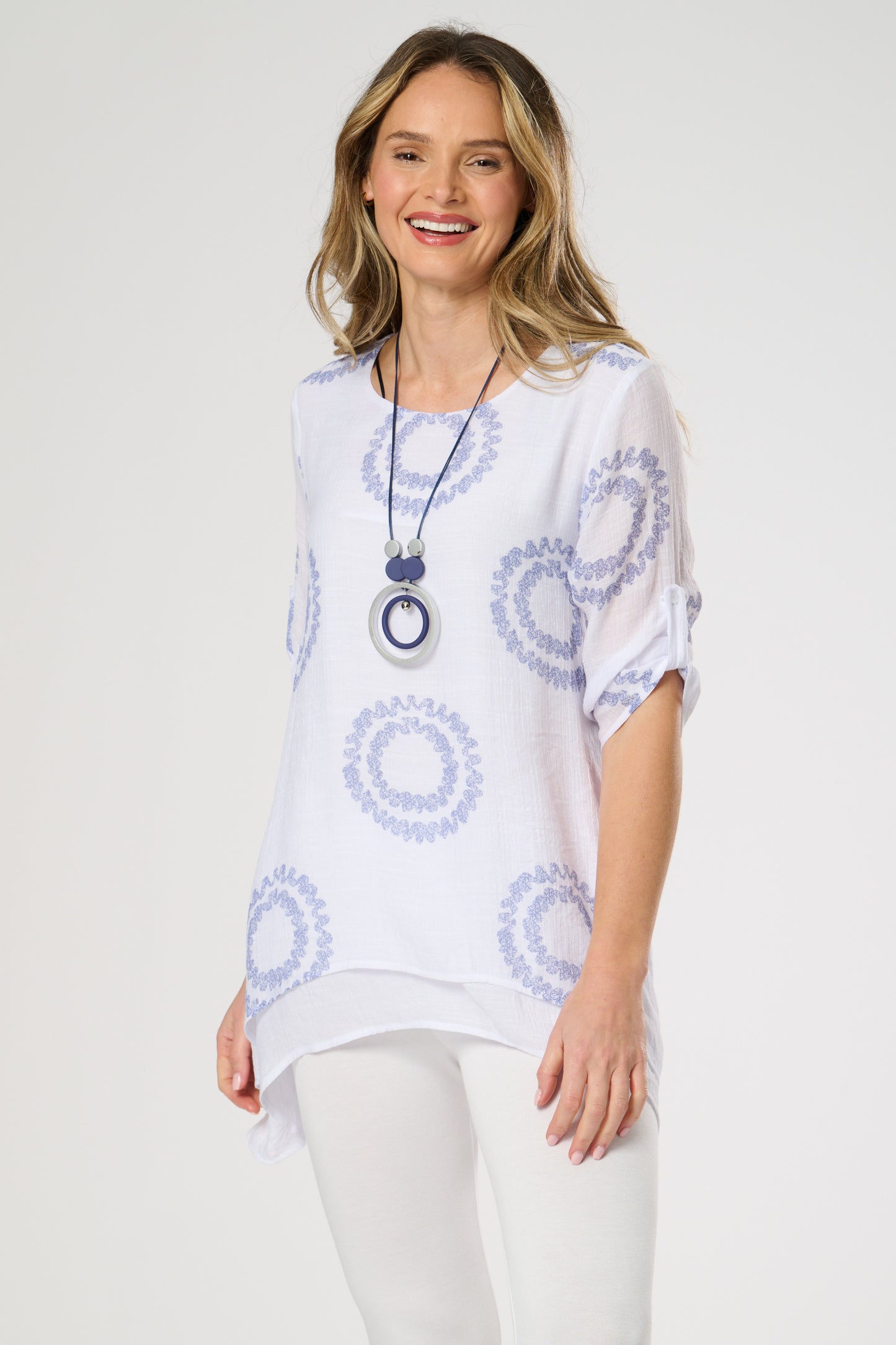 Double layer top with roll up sleeves.