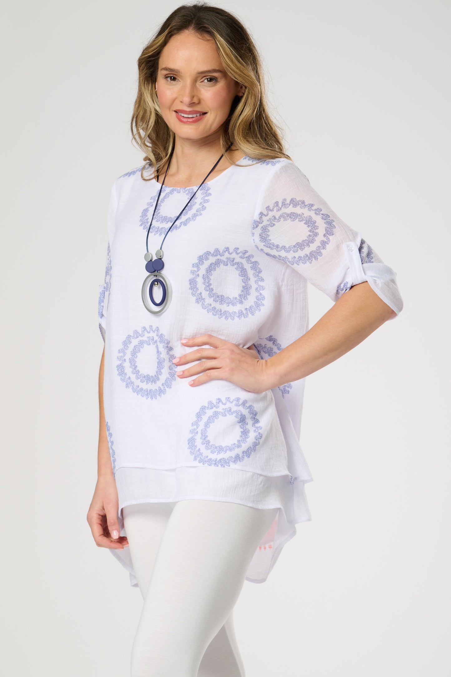 Double layer top with roll up sleeves.