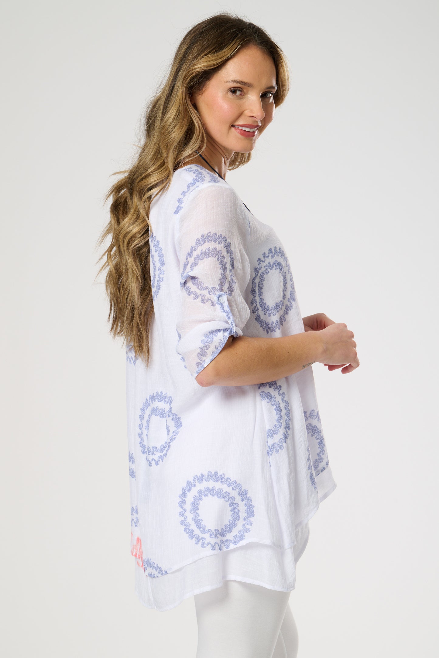 Double layer top with roll up sleeves.