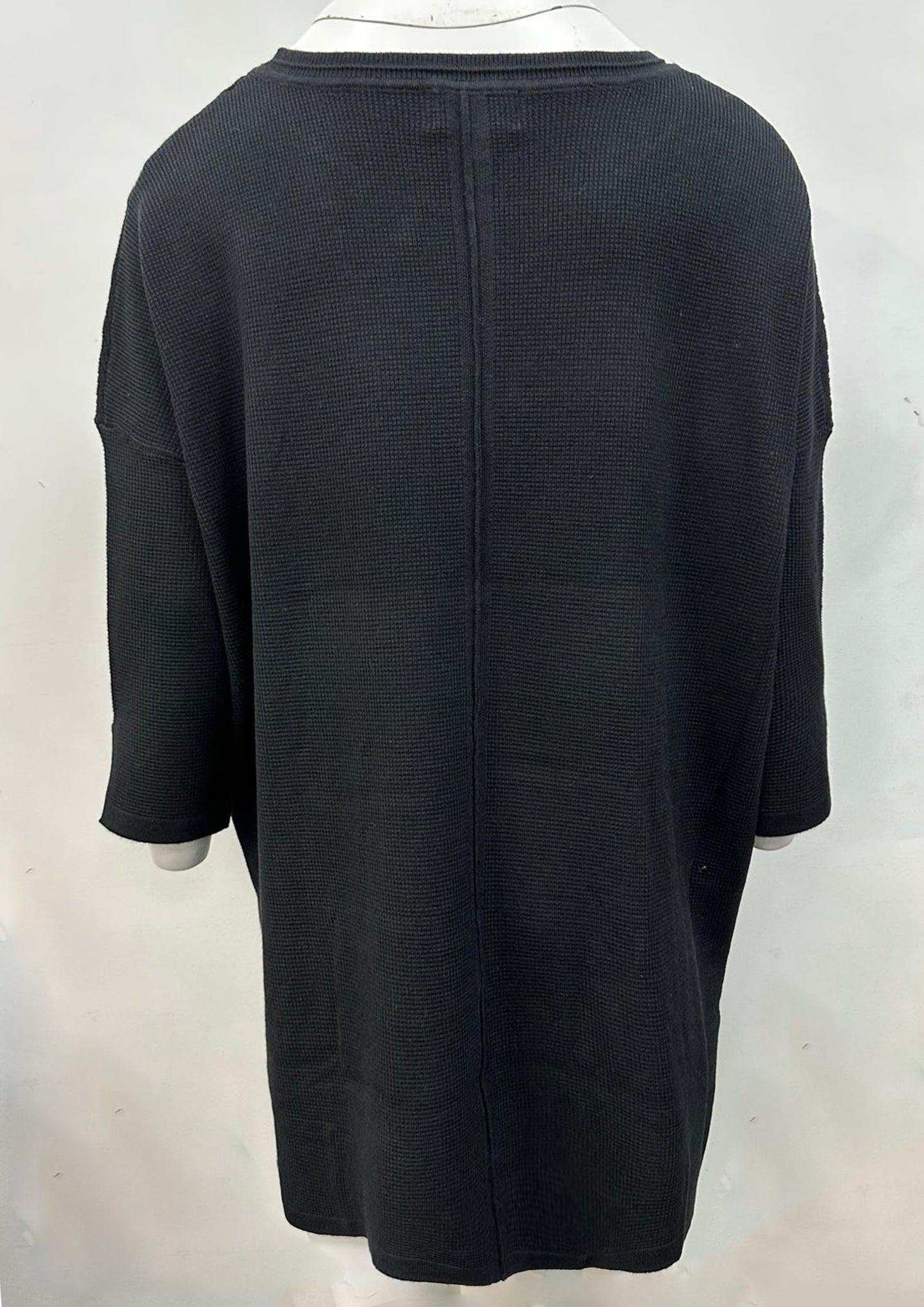 Knitted Elliptical Hem Top